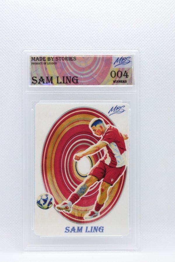 Example custom MBS artwork card: a footballer in red striking the ball in front of red and gold rings, sealed in a Made By Stories slab